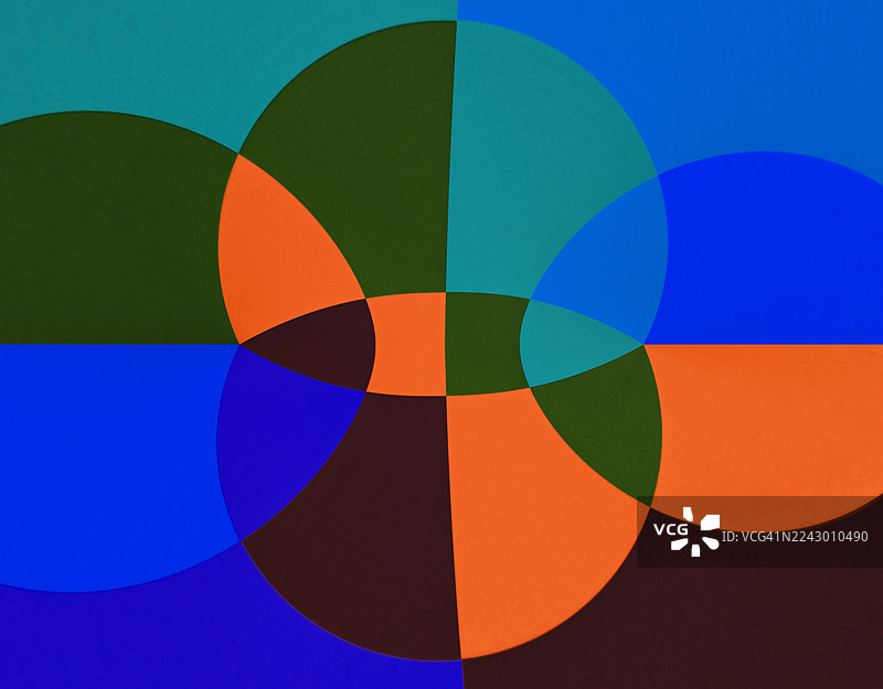 蓝色和橙色调的现代抽象背景，带有各种圆形图案，色彩明亮。图片素材