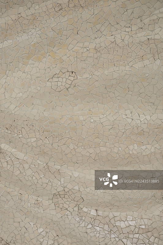 米色石材马赛克拼贴的抽象图案图片素材