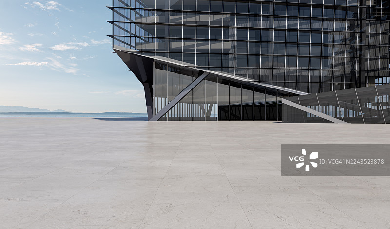 海边的现代玻璃建筑与几何结构图片素材