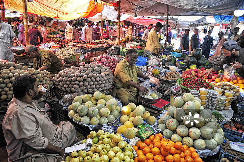 巴基斯坦卡拉奇市场售卖的食物图片素材