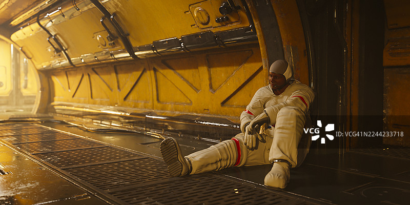 身穿宇航服但未戴头盔的非洲男性图片素材