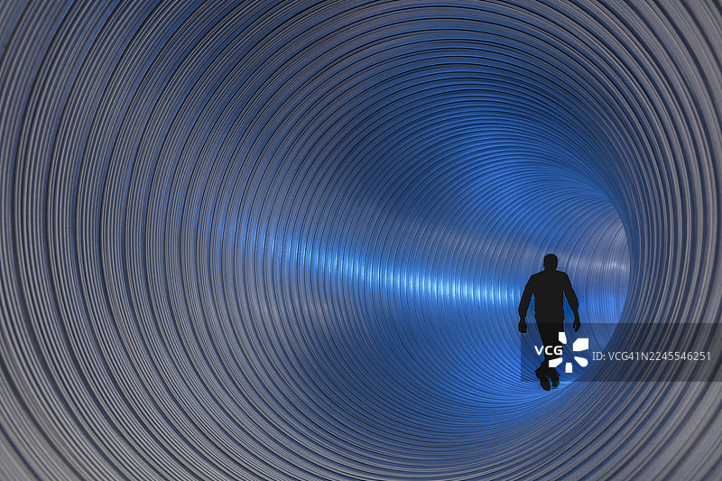 剪影工人走在铝管中，伴有蓝色闪光图片素材