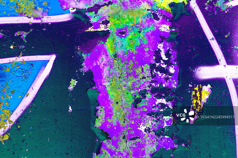 充满活力的街头涂鸦纹理，带有霓虹紫、黄、绿，适合80年代都市、酸性美学图片素材