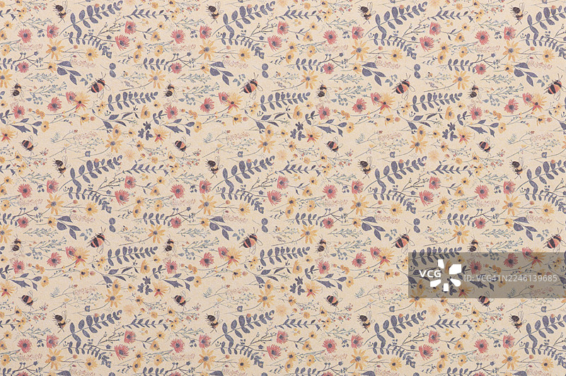 米色底的碎花图案面料图片素材