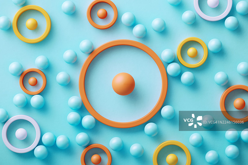 蓝色背景下，色彩缤纷的球体被许多目标符号所吸引图片素材
