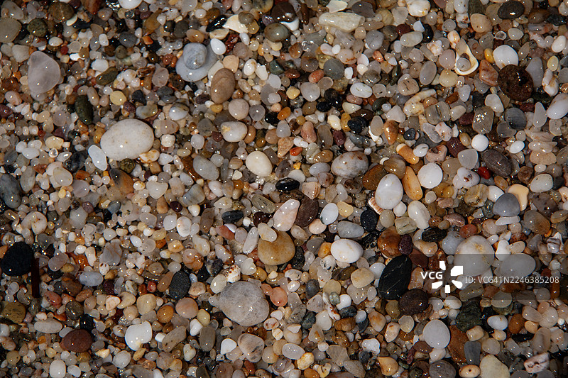 西班牙安达卢西亚阿尔梅里亚省卡沃德加塔拉斯萨利纳斯海滩的粗砂特写图片素材