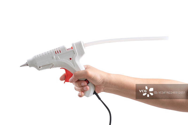 侧面视图，一只手拿着白色胶枪，带有空白文本空间，用于电器、暖通空调设备和床垫中的小型接头连接、表面覆膜和其他产品组装应用图片素材