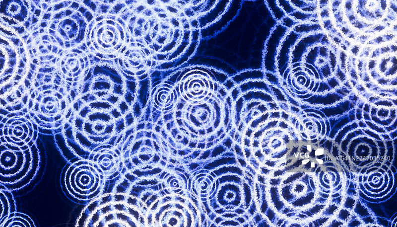 蓝色同心圆构成的抽象未来涟漪图案图片素材