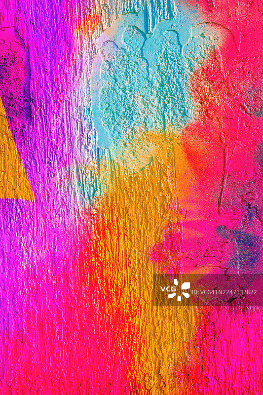 充满活力的霓虹涂鸦纹理，带有亮粉色、橙色和蓝色，适合 80 年代、90 年代的都市艺术风格图片素材