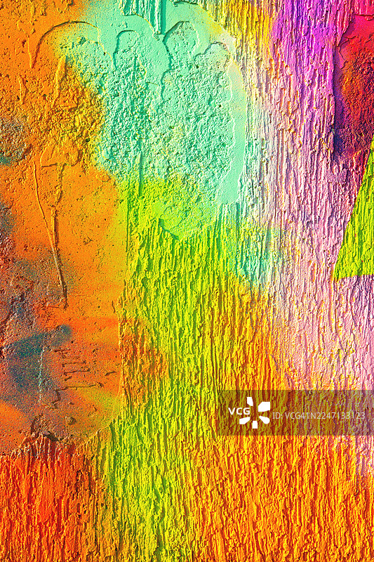 橙色、粉色、绿色充满活力的霓虹涂鸦纹理，适用于90年代都市设计图片素材