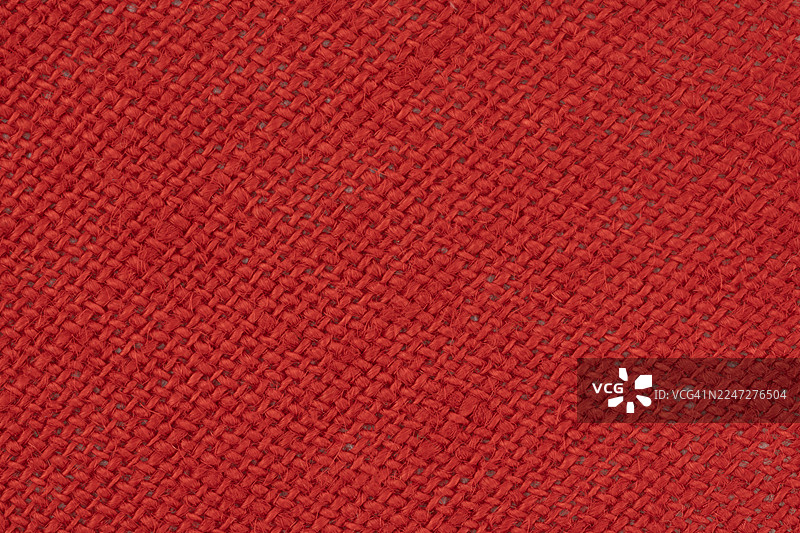全画幅的红色粗麻布纹理和纺织品背景图片素材