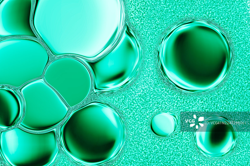 纹理表面上漂浮的抽象绿色液体气泡图片素材