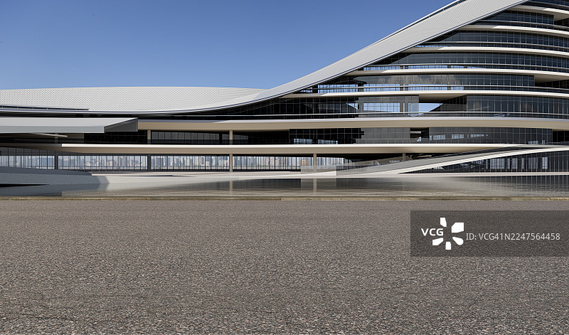 带有弧形白色外墙和落地玻璃窗的现代建筑结构图片素材