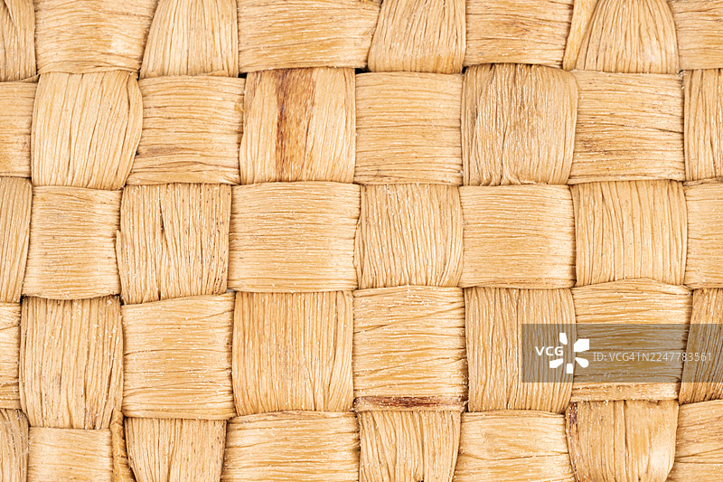 水葫芦编织而成的稻草纹理。抽象的自然背景。图片素材