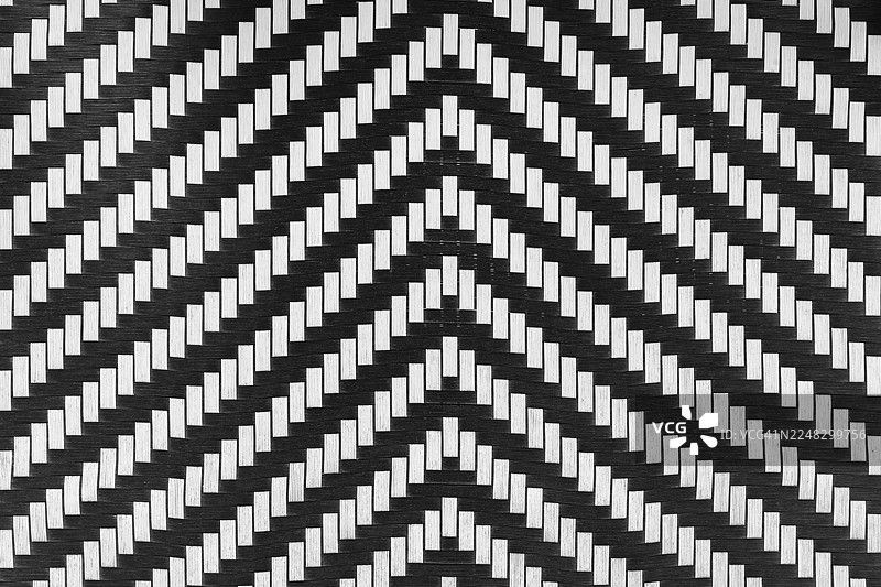 编织纹理的黑白色皮革材质，抽象背景。图片素材