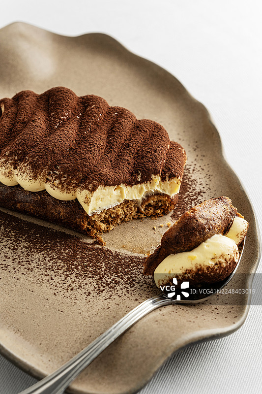 提拉米苏。提拉米苏蛋糕。意大利马斯卡彭芝士和浓缩咖啡制作的提拉米苏甜点。图片素材