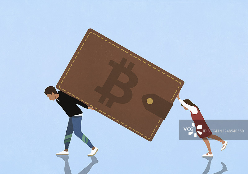 年轻夫妇搬运沉重的比特币钱包图片素材