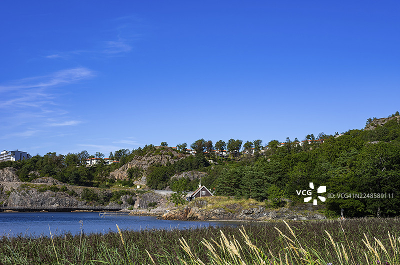 瑞典西约特兰省布胡斯省乌德瓦拉市风景如画的风景和壮丽的海滨长廊图片素材