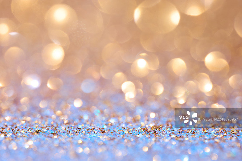 闪耀散景的亮橙色抽象背景图片素材