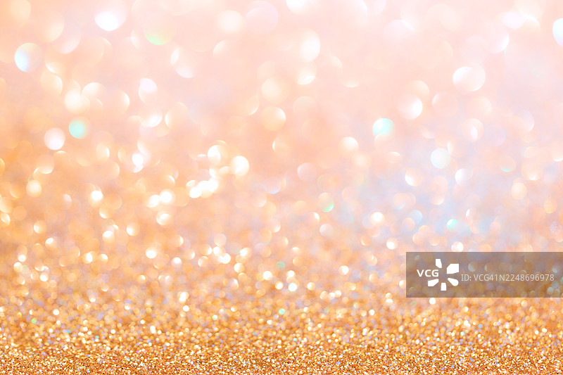 闪耀散景的亮橙色抽象背景图片素材