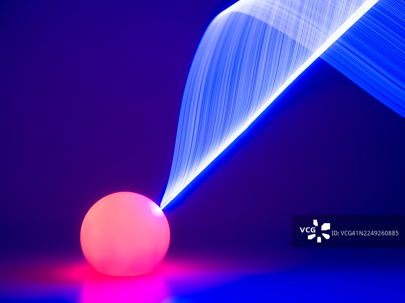 LED灯带和发光球体的光绘。慢快门。抽象科技背景图片素材