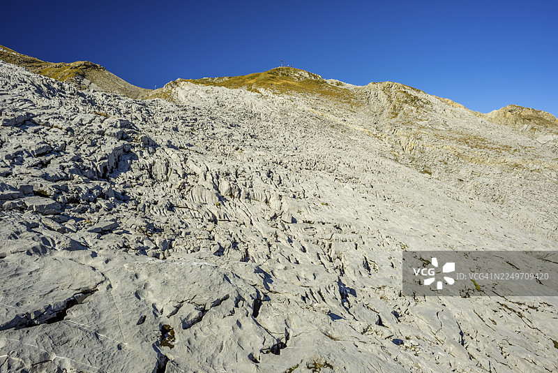 戈特斯阿克高原因地貌,霍赫伊芬山附近的喀斯特地貌,后面是哈嫩科普弗莱山(2085米),克莱因瓦尔德塔尔,福拉尔贝格,阿尔高阿尔卑斯山,奥地利图片素材