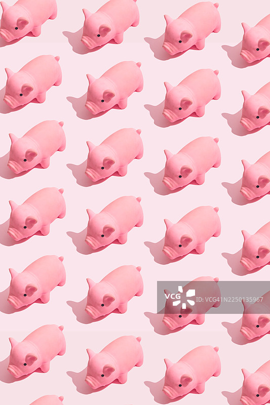 粉红小猪玩具组成的重复图案背景图片素材