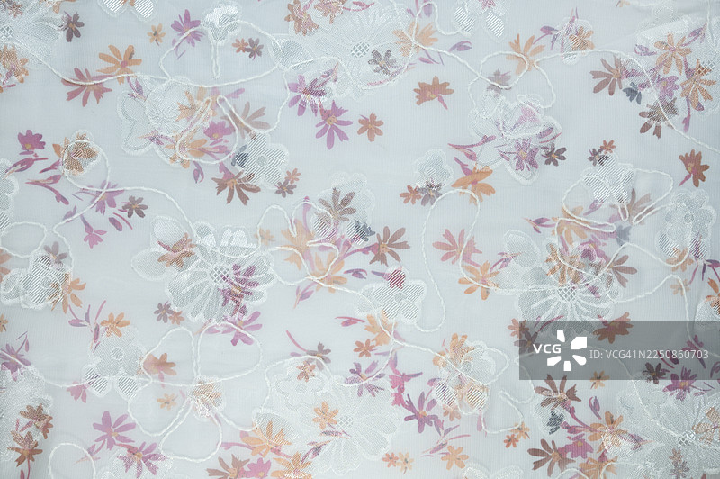 全景拍摄的花卉刺绣蕾丝面料图片素材