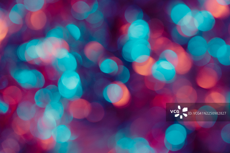 充满活力的多彩散景背景，带有霓虹灯，适合节日或夜生活场景图片素材