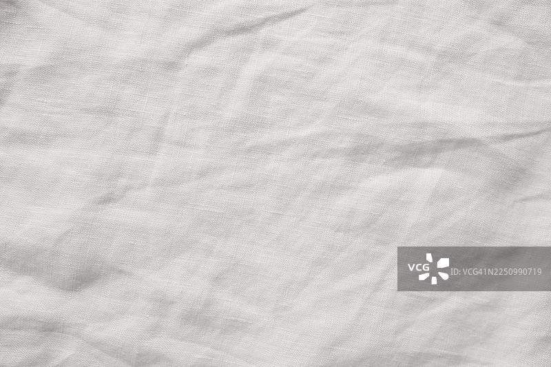 带有柔和纹理的起皱白色亚麻织物背景，适用于中性设计项目图片素材
