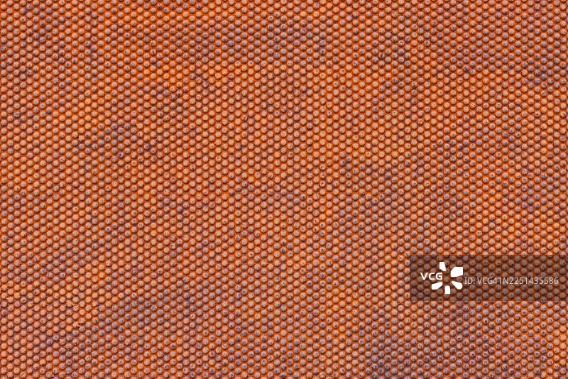 满幅图案金属表面，带有细小均匀的点，构成纹理背景图片素材