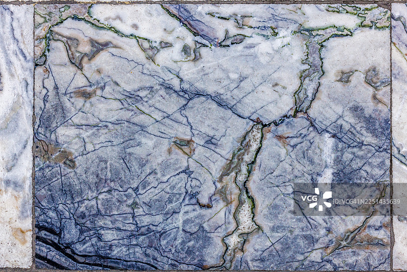 大理石纹理抽象特写，带有纹路和裂痕图片素材