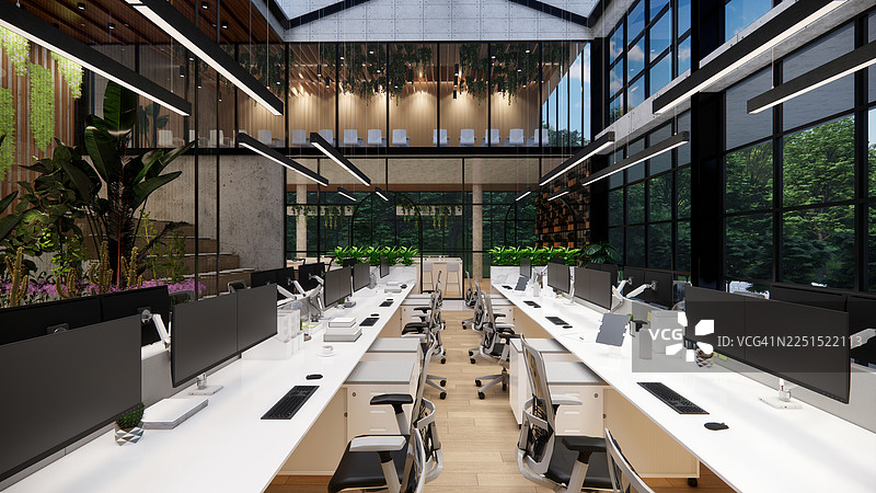现代开放式办公室，配有桌子、办公椅、爬行植物和经理室。图片素材