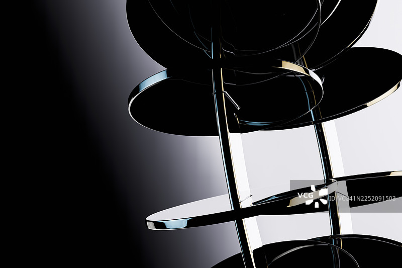 抽象的几何玻璃形状，带有金属反射和折射图片素材