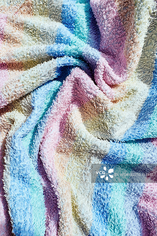 色彩柔和的彩虹背景，带有美丽的毛巾纹理。图片素材