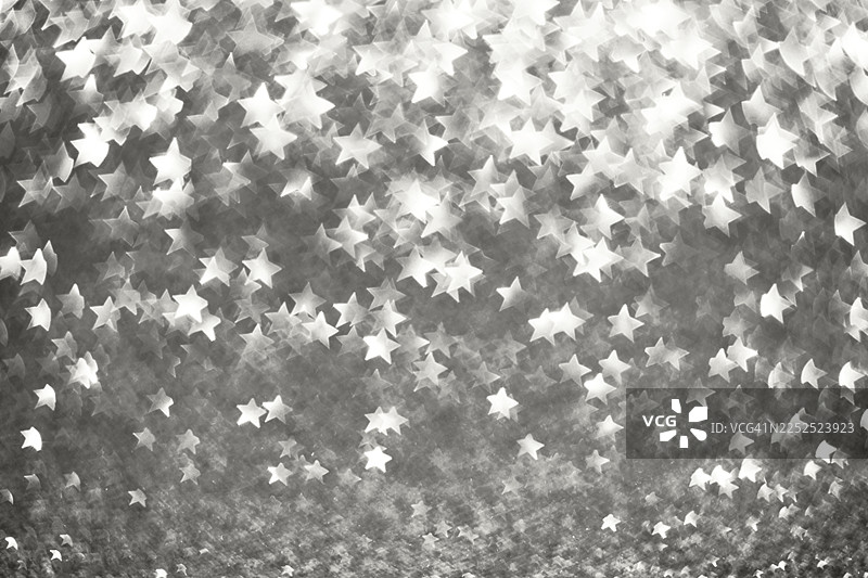 银白色云舞闪耀的闪光星辰散景灯光背景图片素材