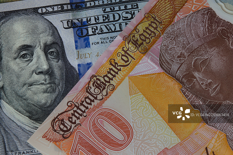 10埃及镑纸币和100美元纸币图片素材