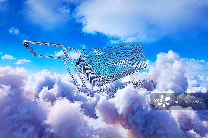 飘浮在云朵中的购物推车图片素材