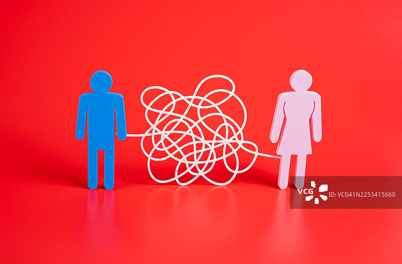 一条缠绕的白色细线连接着蓝色男性和粉色女性形象，背景为红色，象征着关系的复杂性图片素材