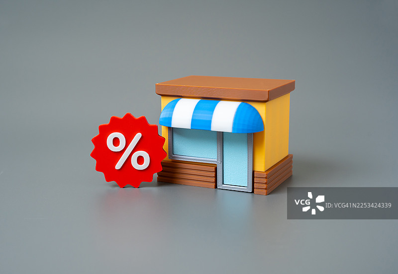 象征折扣和促销的百分号迷你玩具店图片素材