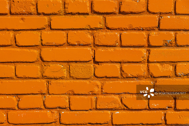 充满活力的橙色涂漆砖墙纹理背景图片素材
