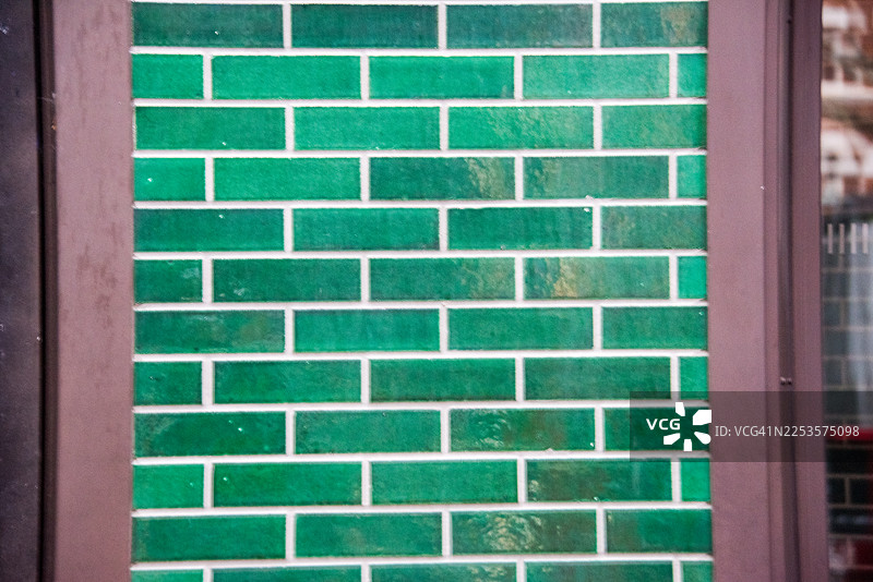 菲茨罗维亚绿色釉面砖墙细节图片素材