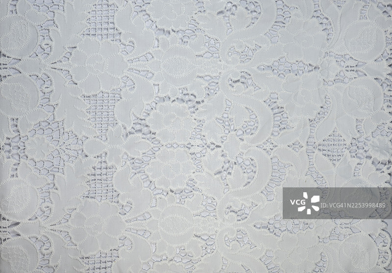 全画幅拍摄的白色刺绣蕾丝面料图片素材