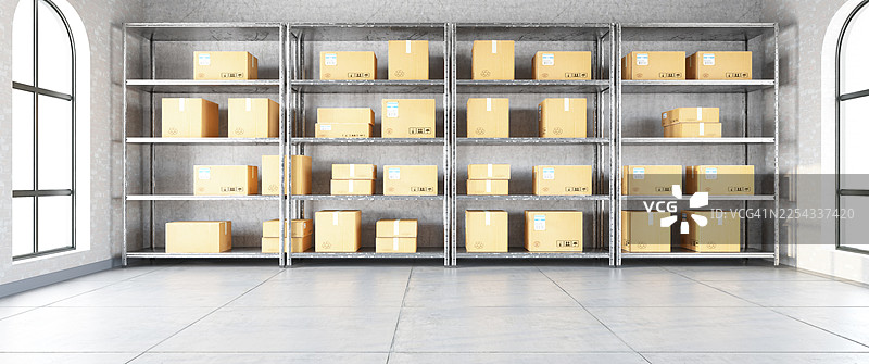 现代仓库中的工业仓储货架和纸板箱图片素材