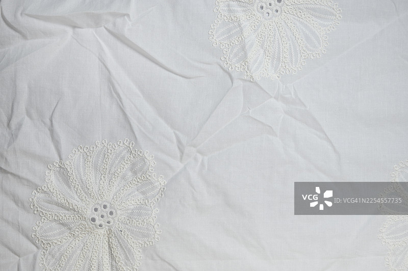 全画幅拍摄的白色刺绣蕾丝面料图片素材