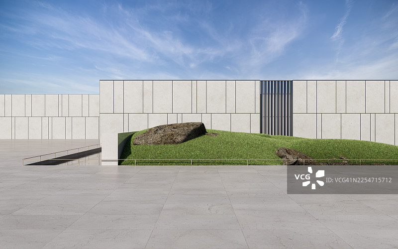 现代建筑外观，带有草丘和岩石景观图片素材