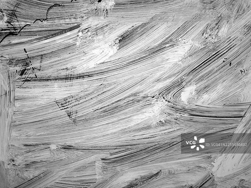 特写：窗玻璃上厚厚的白色油漆层。黑白。法国巴黎。图片素材