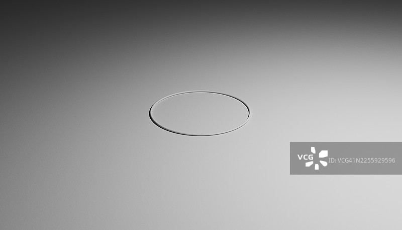 极简白色圆圈置于光滑灰色渐变背景上，简约与完美的理念图片素材