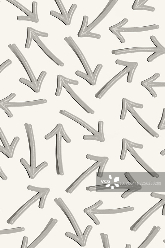许多灰色箭头指向随机方向，形成图案图片素材