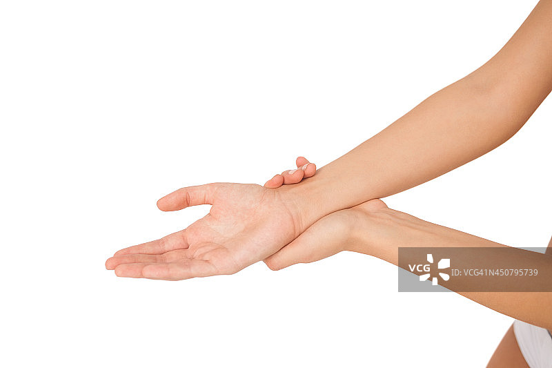 捂着受伤手腕的年轻女人图片素材